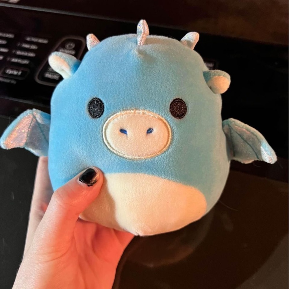 Flip squishmallow blue and multi color Dino